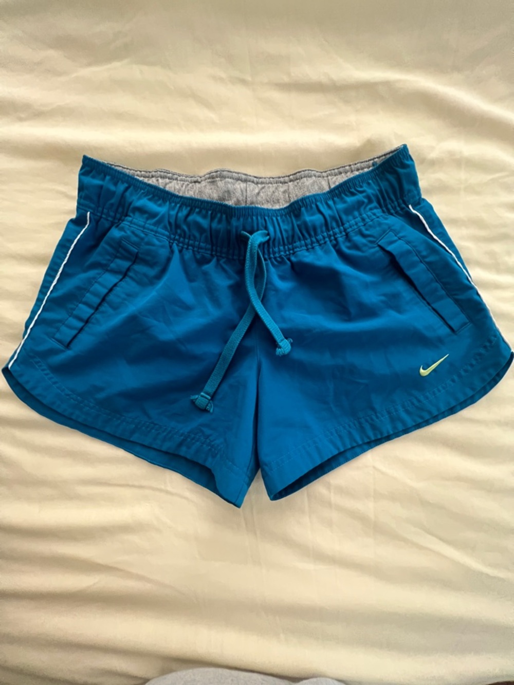 Nike Women's Teal Athletic Shorts with White Piping